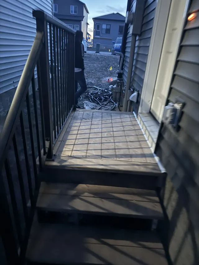 Deck stairs with tiled landing