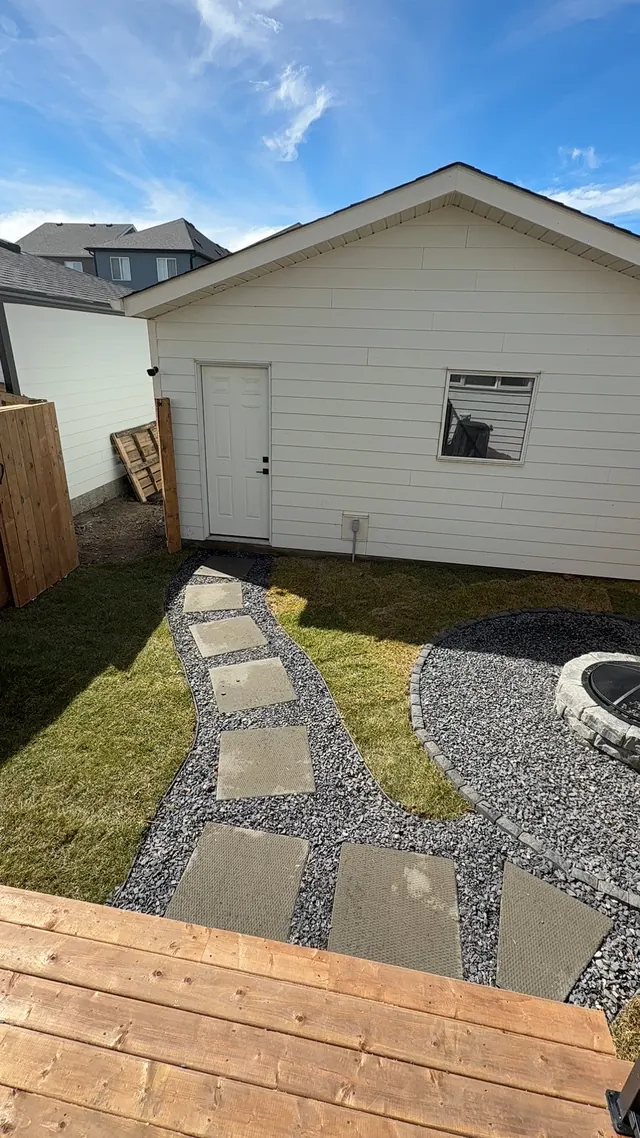 Slab pathway leading to a fire pit