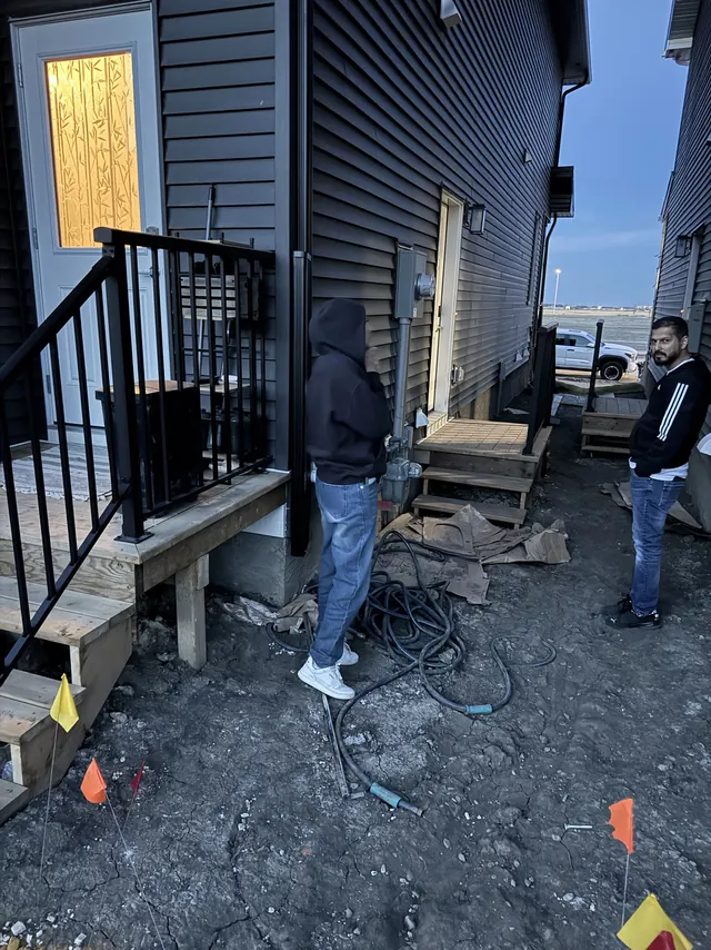 Crew working on site during a build