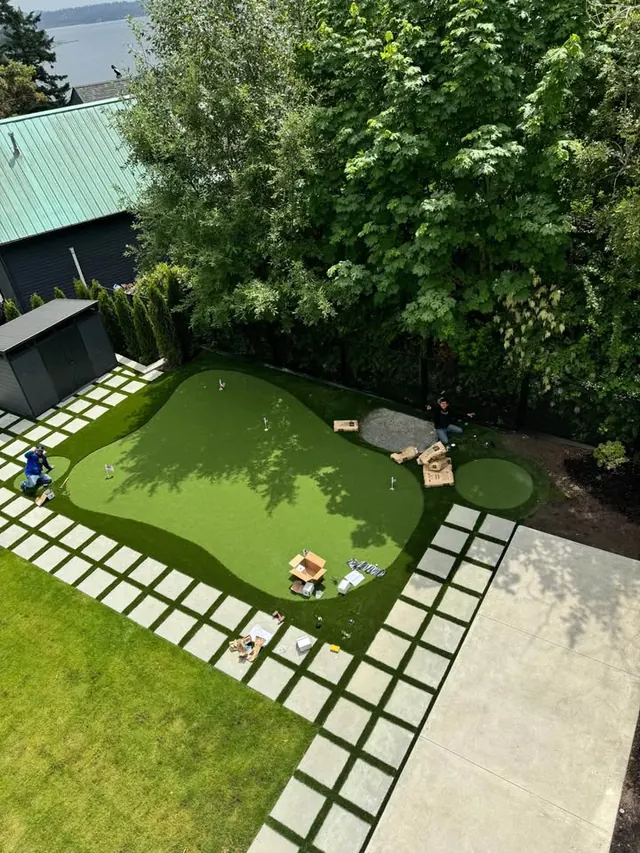 Aerial view of a putting green with slab stepping stones