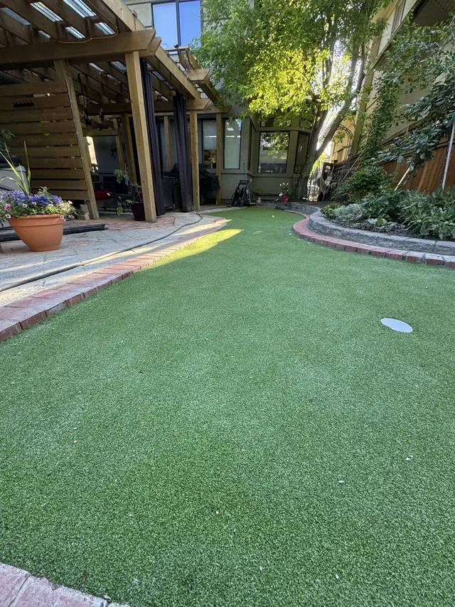 Putting green surface with cup set in place